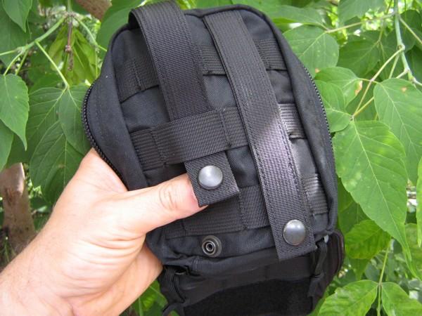 MOLLE pouch attachment mechanism.