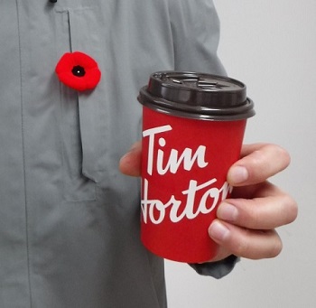 Mon coquelicot et ma tasse de Tim.